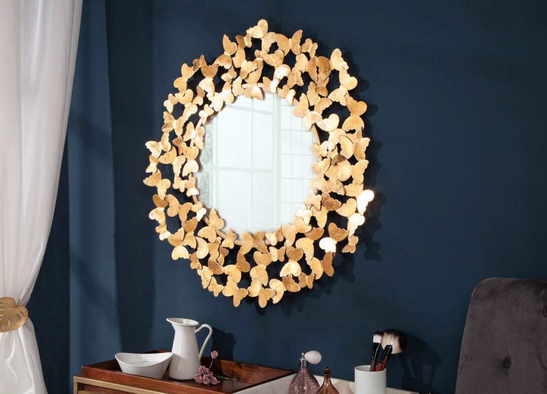 miroir doré design avec ornement de papillons