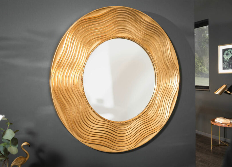 miroir doré rond avec ondulation