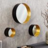 Miroirs muraux ronds en métal noir et or