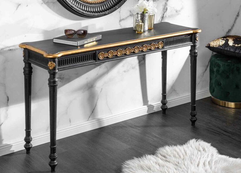 console glamour noir et dorée