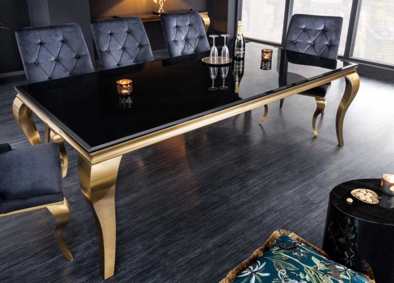 table a manger originale en verre noir et pieds dore baroque