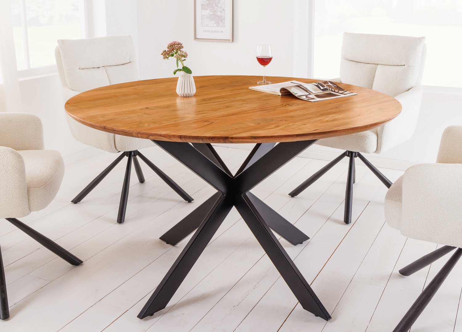 table de repas ronde en bois et metal noir 130 cm avec des chaises confortables blanche et noir