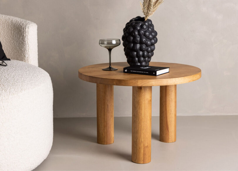 table de salon ronde et pieds en cylindres design en bois massif