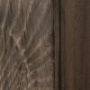 zoom sur les façades en bois sculpté