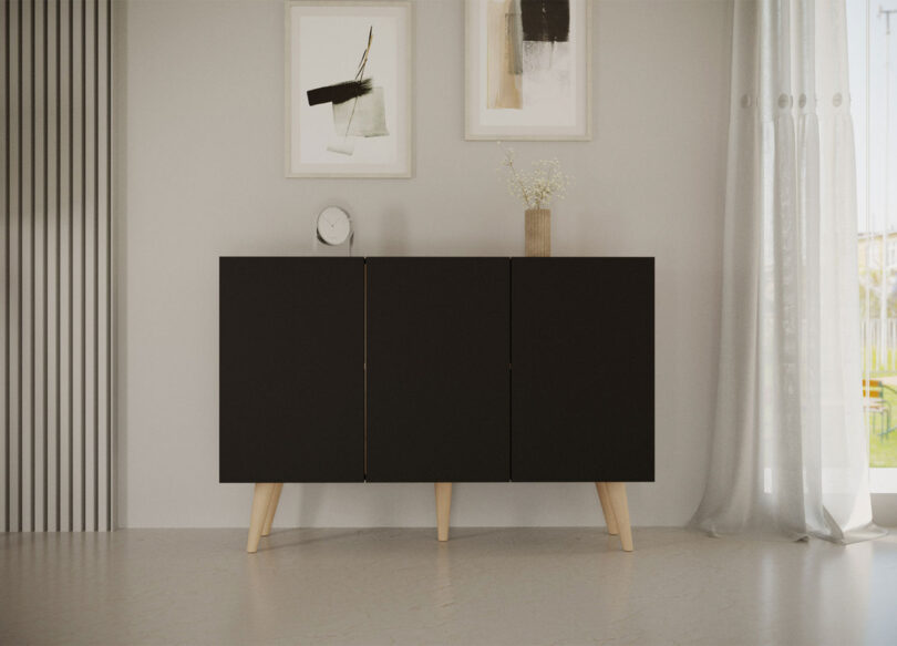 buffet salle à manger noir style scandinave avec pieds en bois