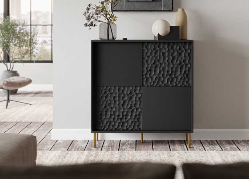 meuble commode noire et métal dorée