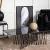 table basse 140 cm aspect marbre noir brillant et pieds design