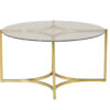 table de salon ronde style rétro avec un plateau en verre et une structure en métal doré
