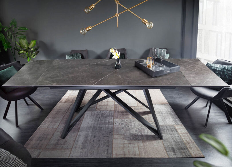table salle à manger extensible en céramique et pieds en métal noir