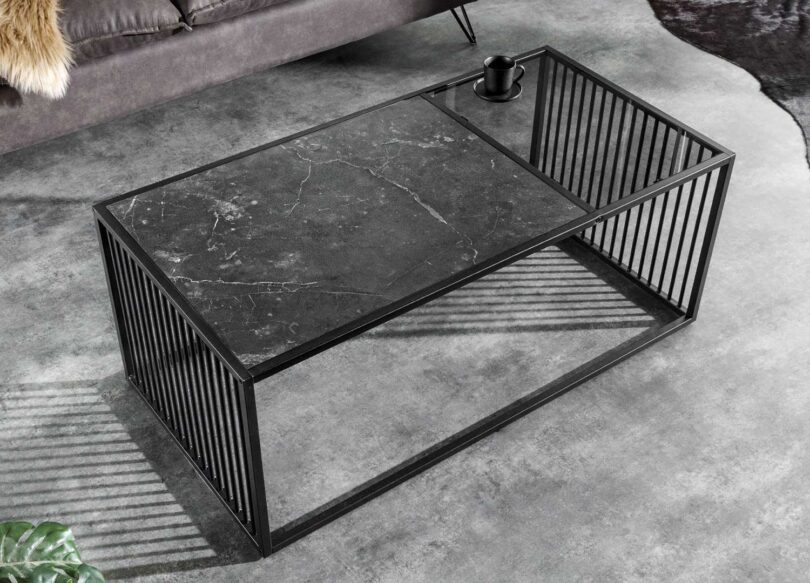 Table de salon aspect marbre foncé design
