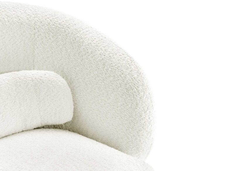 Zoom sur le tissu boulé du fauteuil de salon blanc