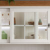 Zoom sur le vaisselier en option du buffet blanc
