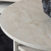 Table basse ronde aspect marbre beige moderne