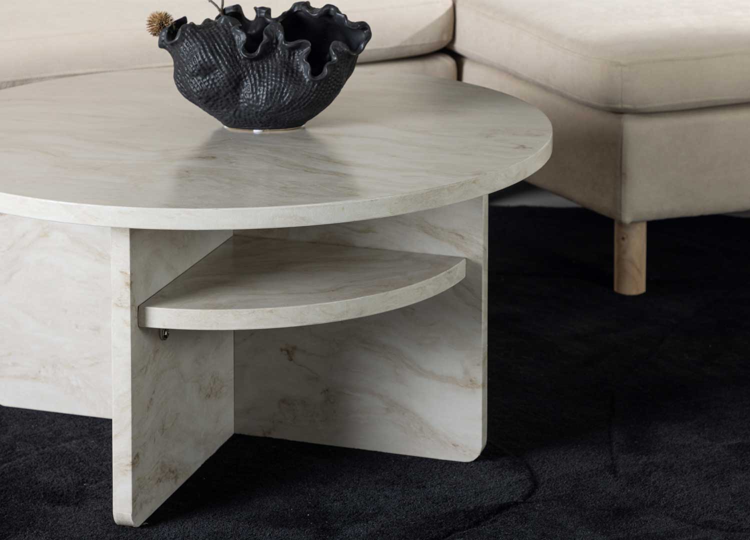 Table basse ronde aspect marbre beige moderne