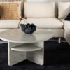 Table basse ronde aspect marbre beige moderne