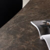 Table de salle à manger aspect marbre brun forme organique 230cm