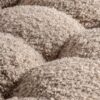 Fauteuil en tissu bouclé beige