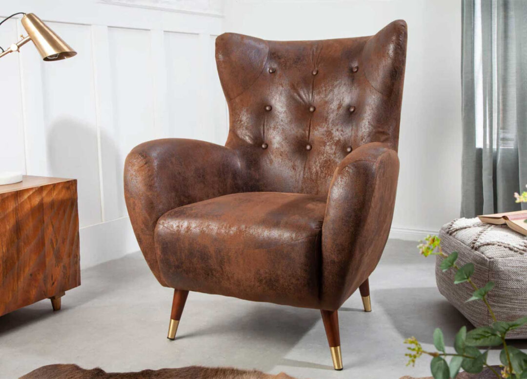 Fauteuil oreille marron antique