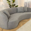 Canapé haricot en tissu bouclé gris 230 cm