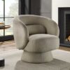 Fauteuil rotatif en tissu bouclé taupe