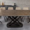 Table de repas aspect bronze rouille extensible