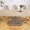 Table à manger ovale extensible aspect grège travertin moderne