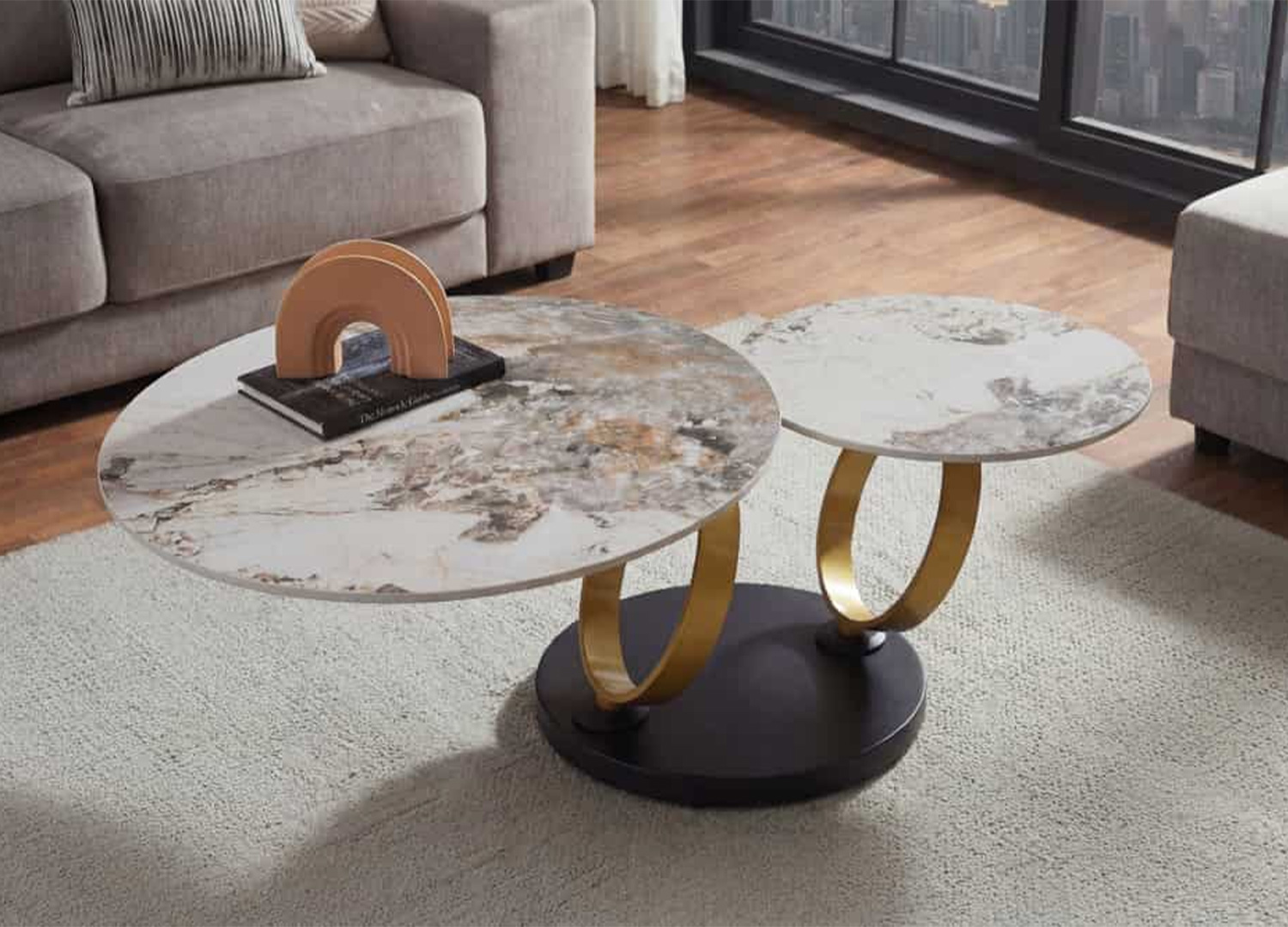 Table basse TIZIO ronde pivotante en céramique blanc brun avec anneaux or mat