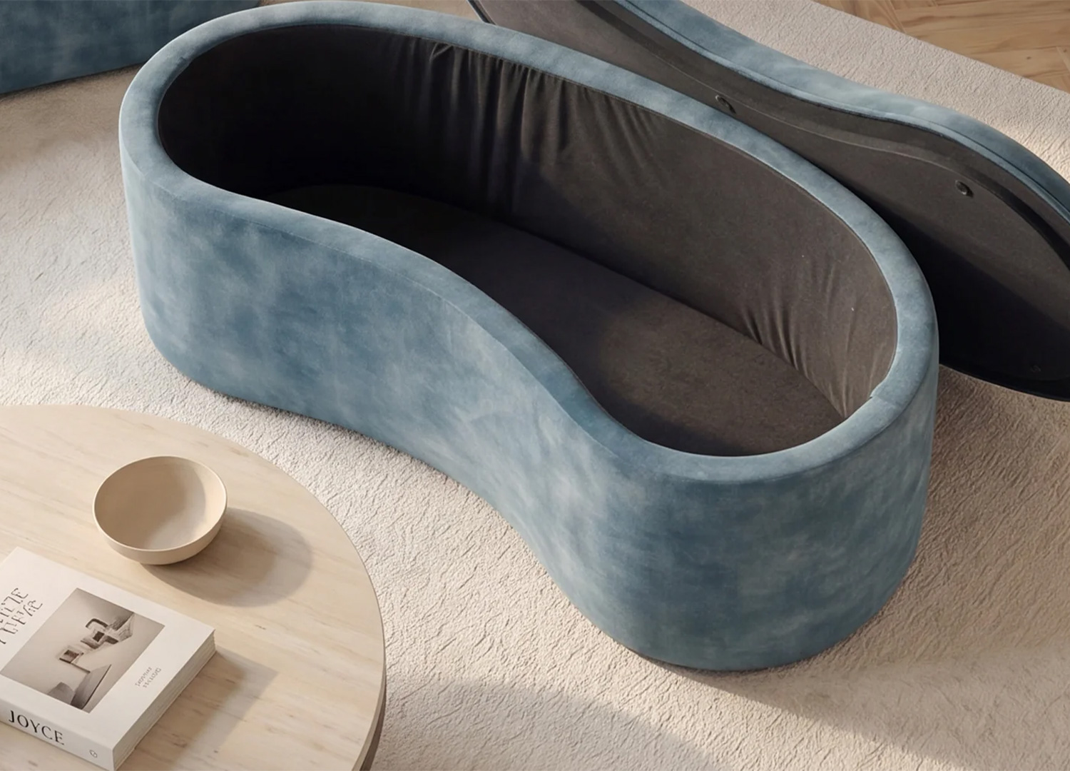 Gros plan sur l’intérieur du coffre de rangement de la banquette SOLANE bleu pétrole