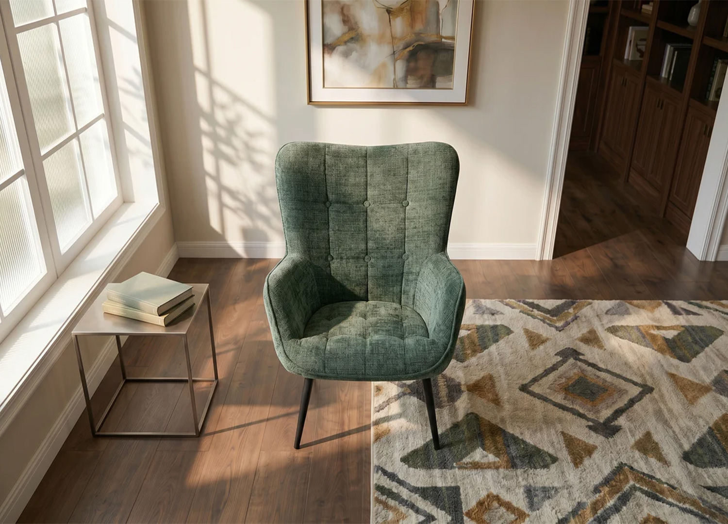 Vue plongeante du fauteuil SÉLÈNE vert montrant son assise capitonnée et sa coque enveloppante