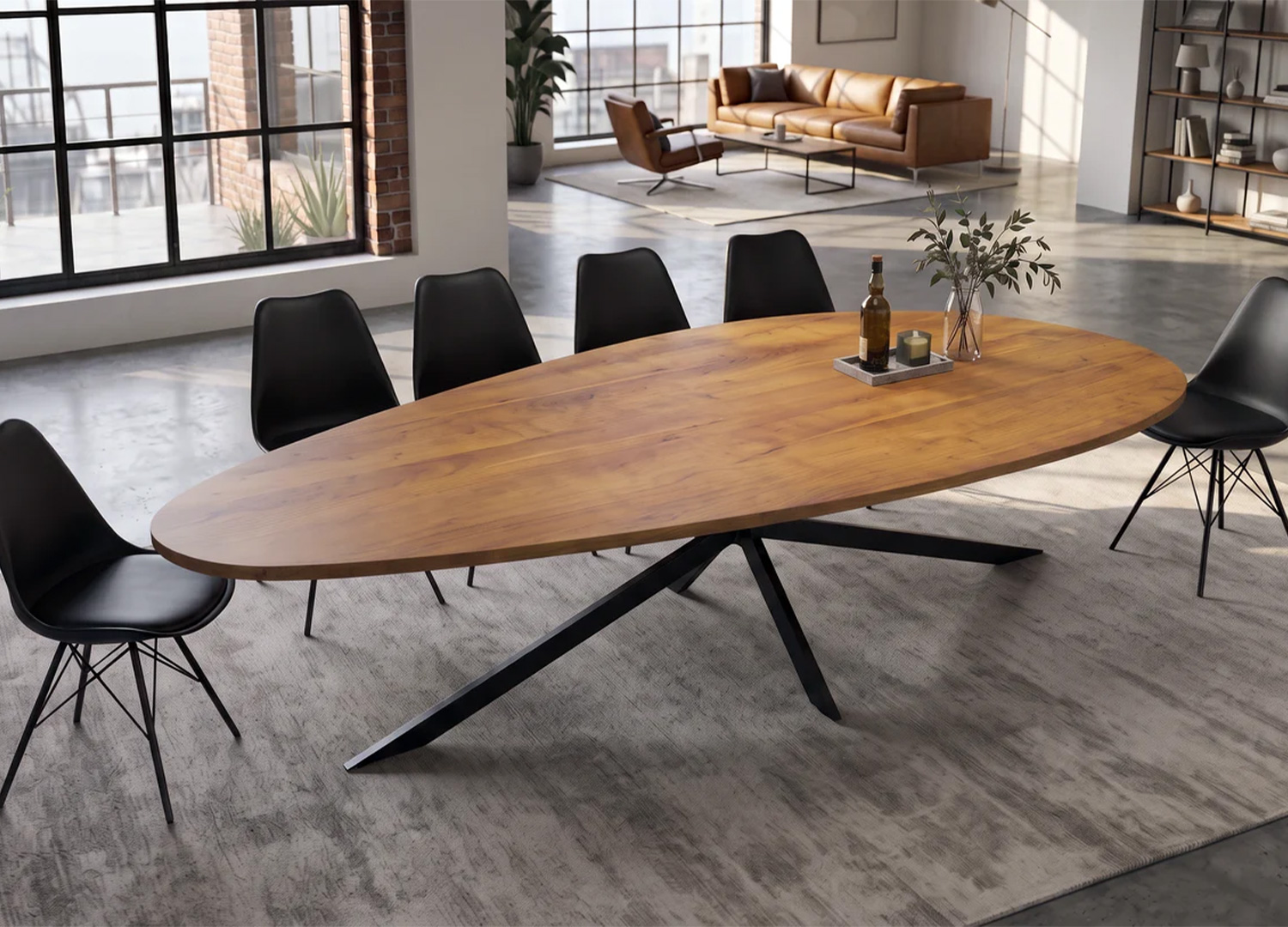 Table à manger ovale SOLAL 240 cm en acacia massif associée à des chaises noires dans un intérieur contemporain