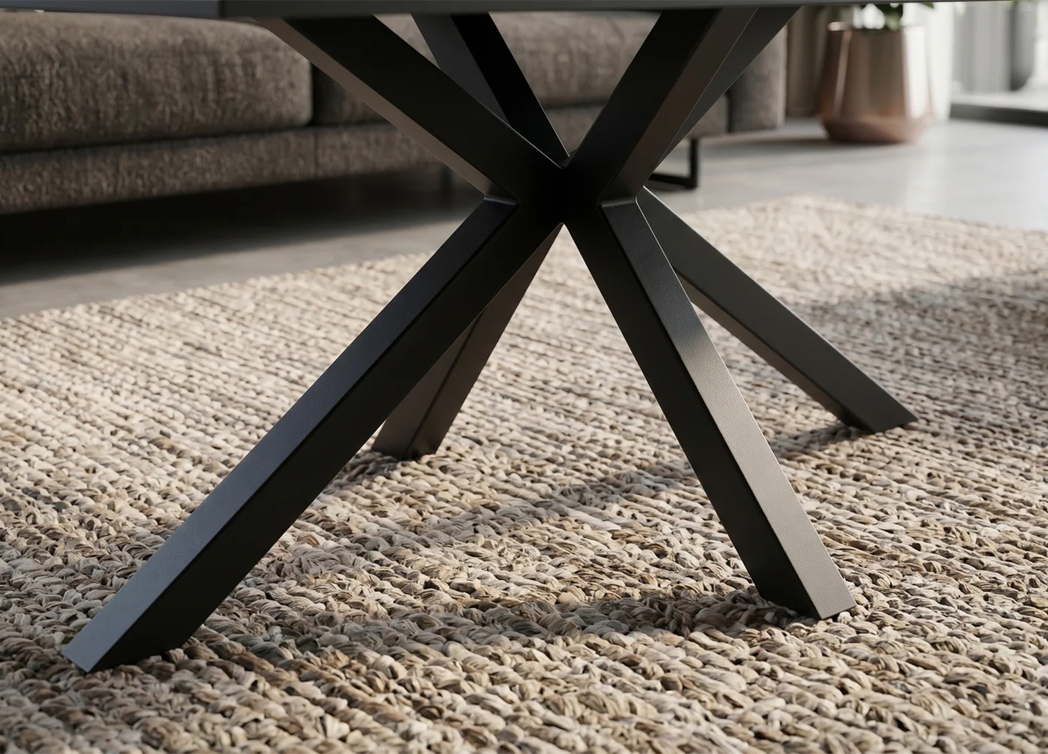 Détail du piètement étoile en métal noir de la table basse KAVEN