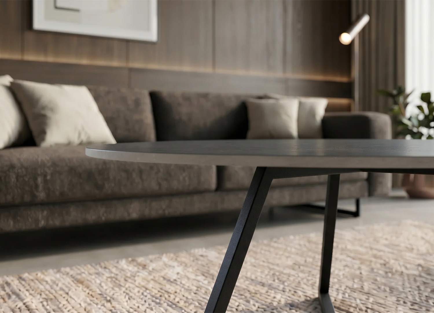 Vue de profil du plateau en céramique anthracite de la table basse ORBIS 70 cm