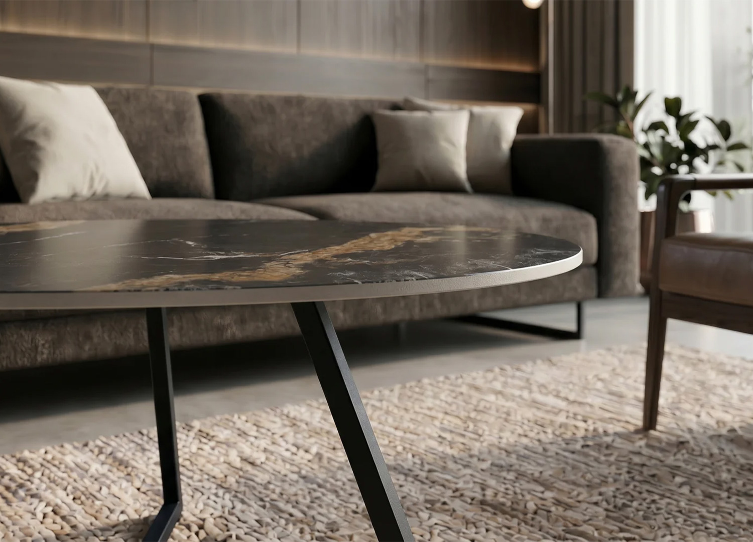 Vue de profil de la table basse ORBIS 90 cm avec plateau céramique noir doré