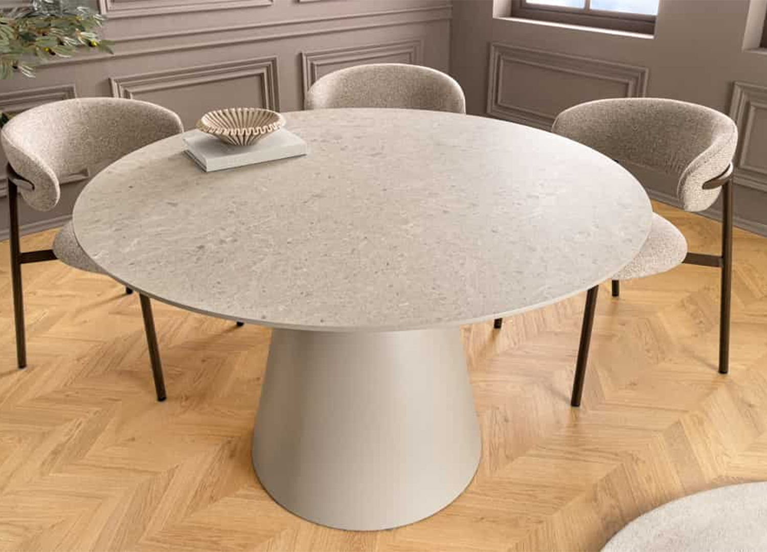 Table de repas ronde ÉLORIA 120 cm effet pierre grise dans un intérieur élégant